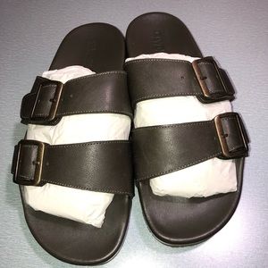 Slip on sandals with buckles
